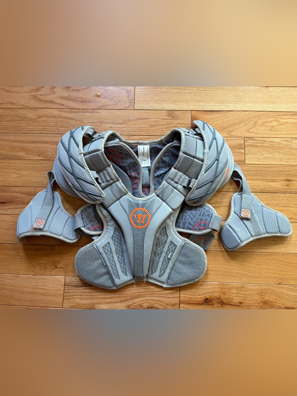 Warrior Burn Hitman VPS Lacrosse Shoulder Pads Youth Large Grey Orange